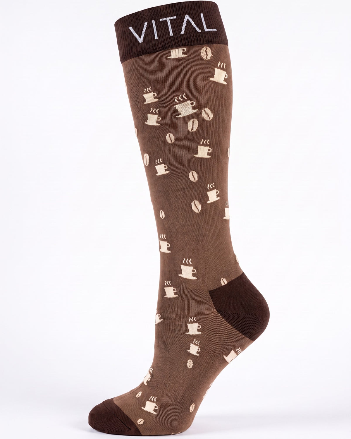Espresso knee-high compression sock, coffee cup and bean print, dark brown heel, studio shot